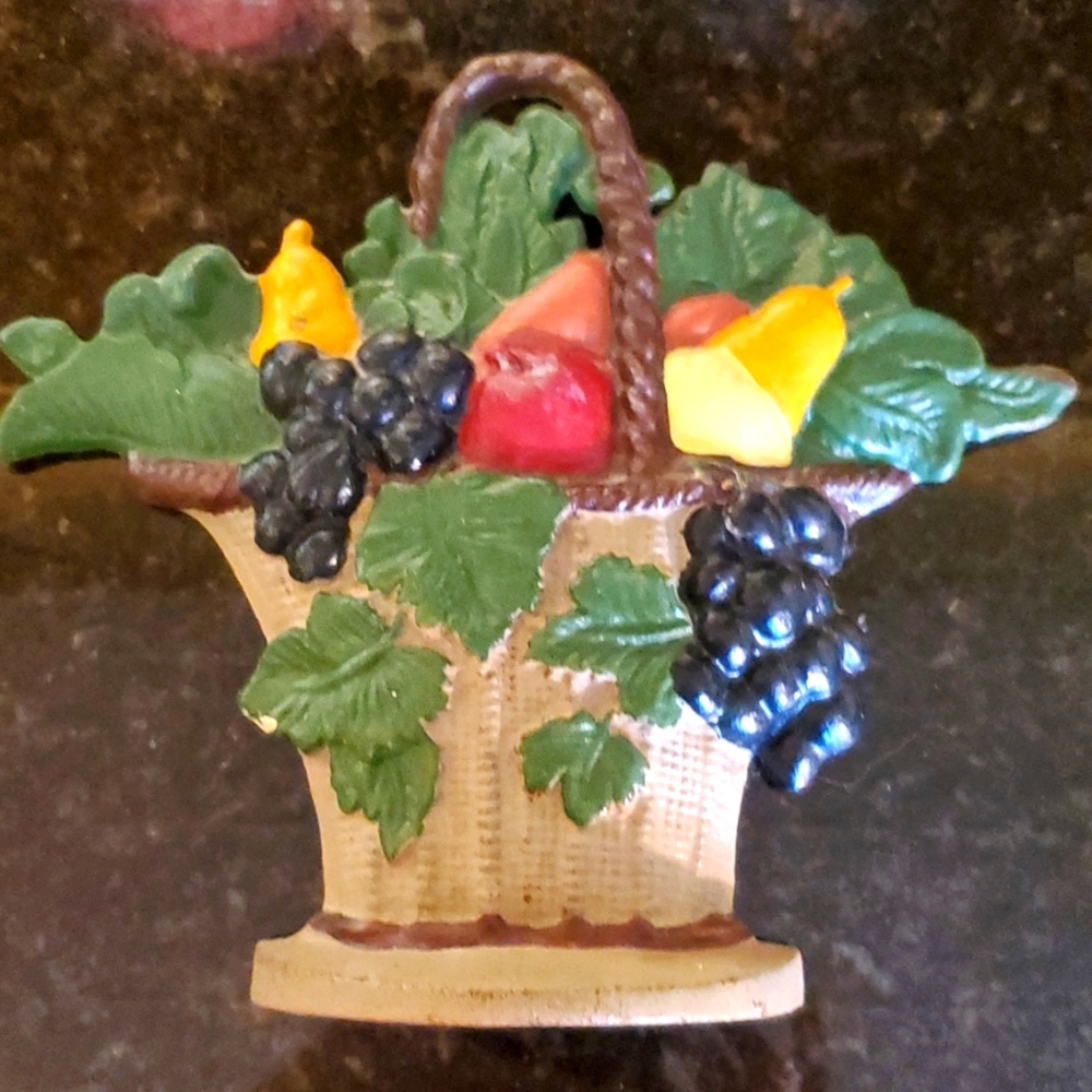Cast iron fruit basket doorstop